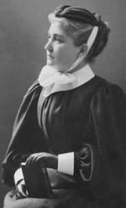 Jean Scott, Superintendent of the Methodist Deaconess Home and School circa 1897 wearing the prescribed navy blue uniform of the day.